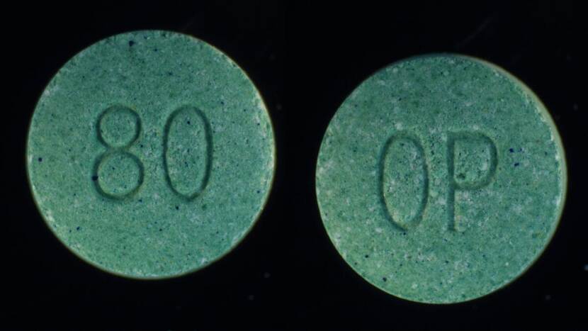 Groene tabletten met "80 OP"